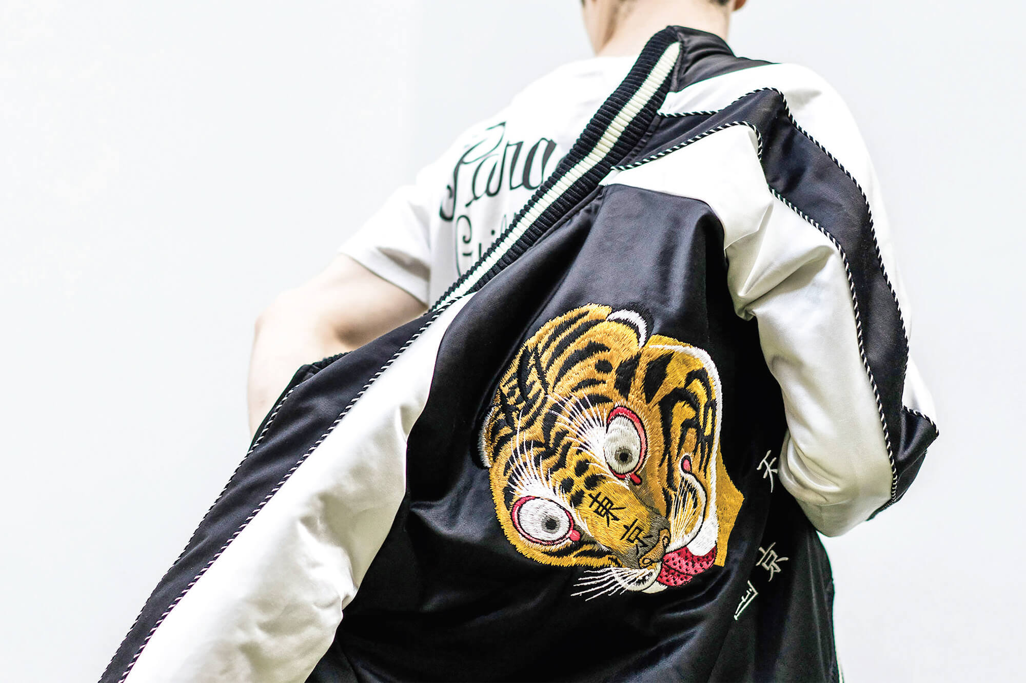 Western luxury fashion brands deal with the tiger theme in asian traditions