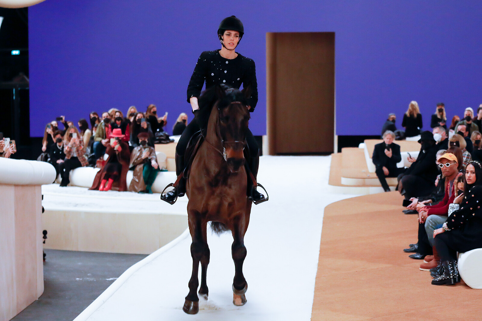 Chanel haute couture spring-summer 2022 princess of monaco rides a horse on the catwalk
